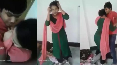 Young Bihari boy kissing her shy girlfriend front of friends