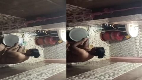 Neighbor aunty taking bath caught by voyeur