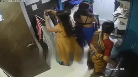 Desi Milf's Changing Clothes Captured In CCTV Cam